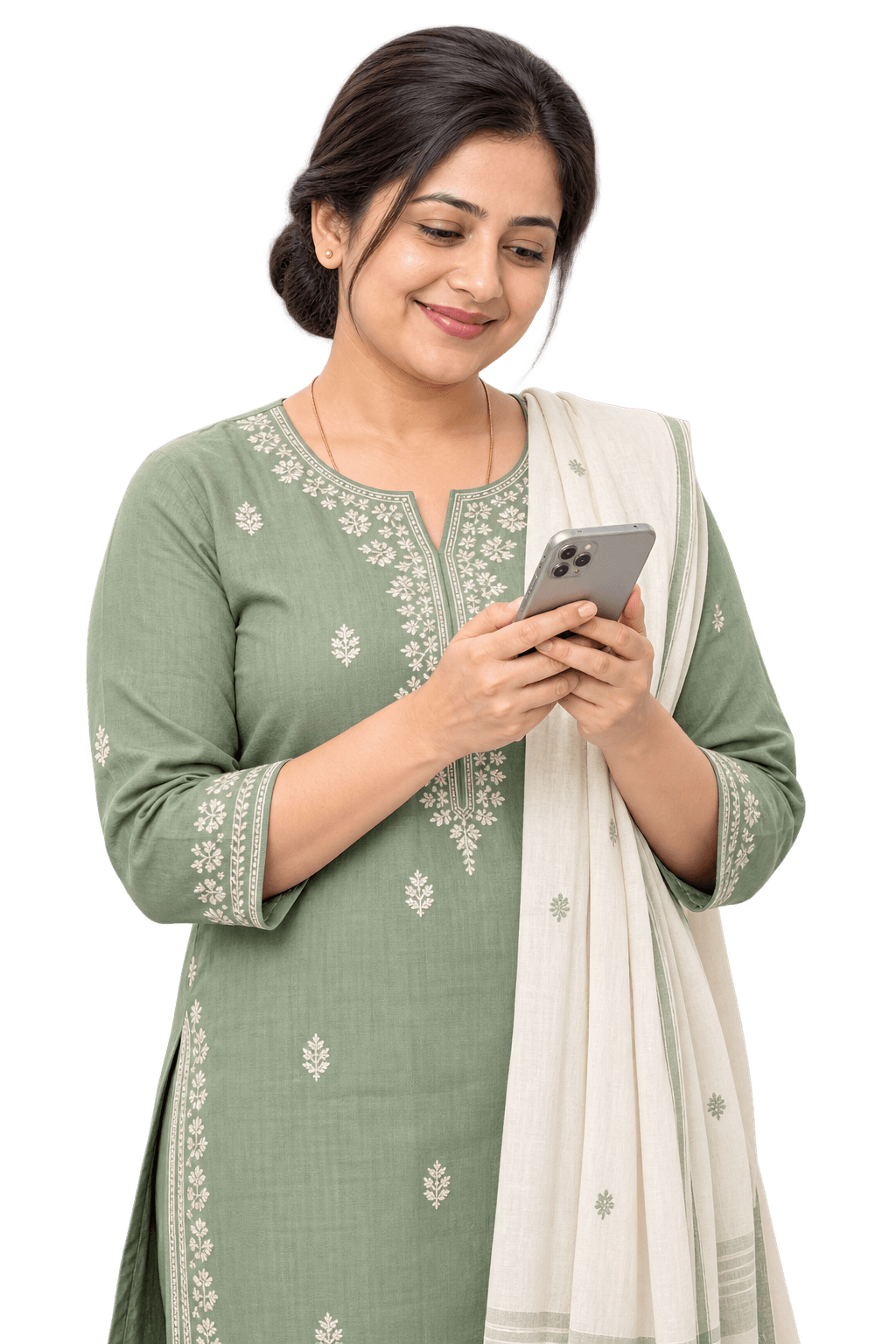 Mother in a soft green kurta reading a reply from the school on her phone, with a calm, relieved smile