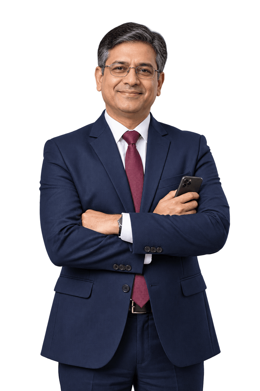 Navy blazer, maroon tie और चश्मे में, हाथ में phone लिए हाथ बाँधे मुस्कुराते school principal