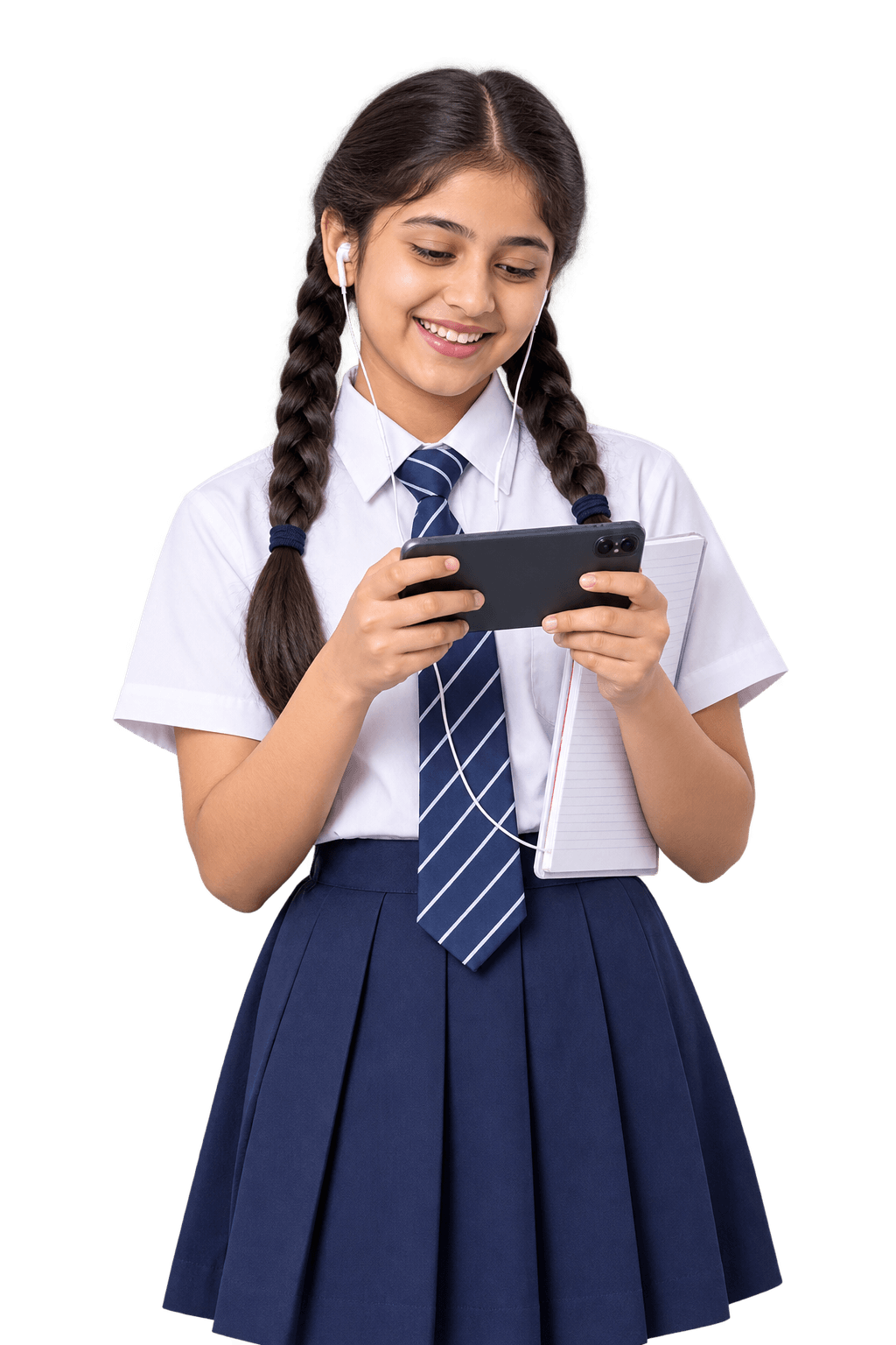 Indian schoolgirl in uniform with earphones, watching a lesson video on her phone, her notebook under her arm